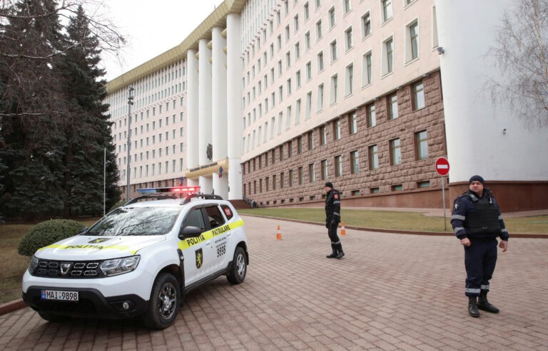 FILE PHOTO: Officers guard Moldova's parliament